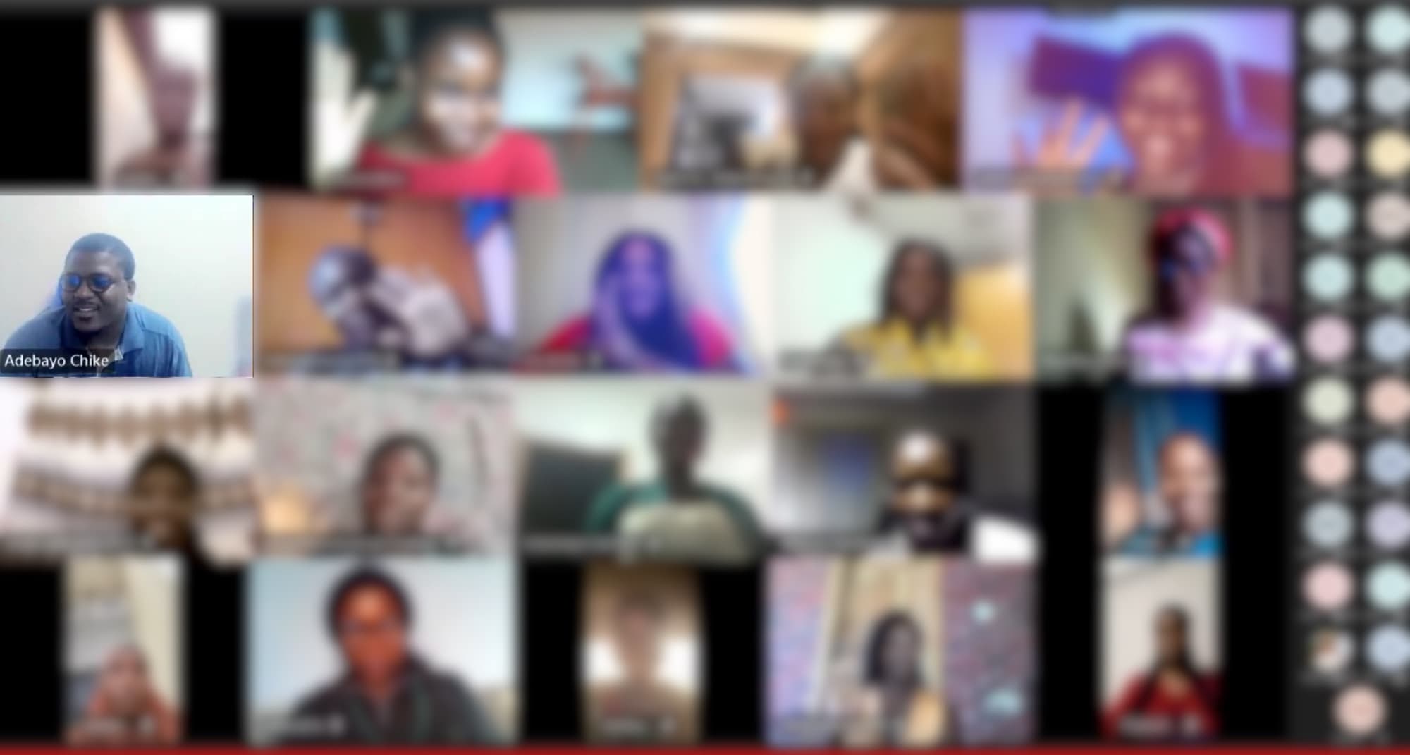 Adebayo Chike teaching a live online design class, with students' faces blurred for privacy
