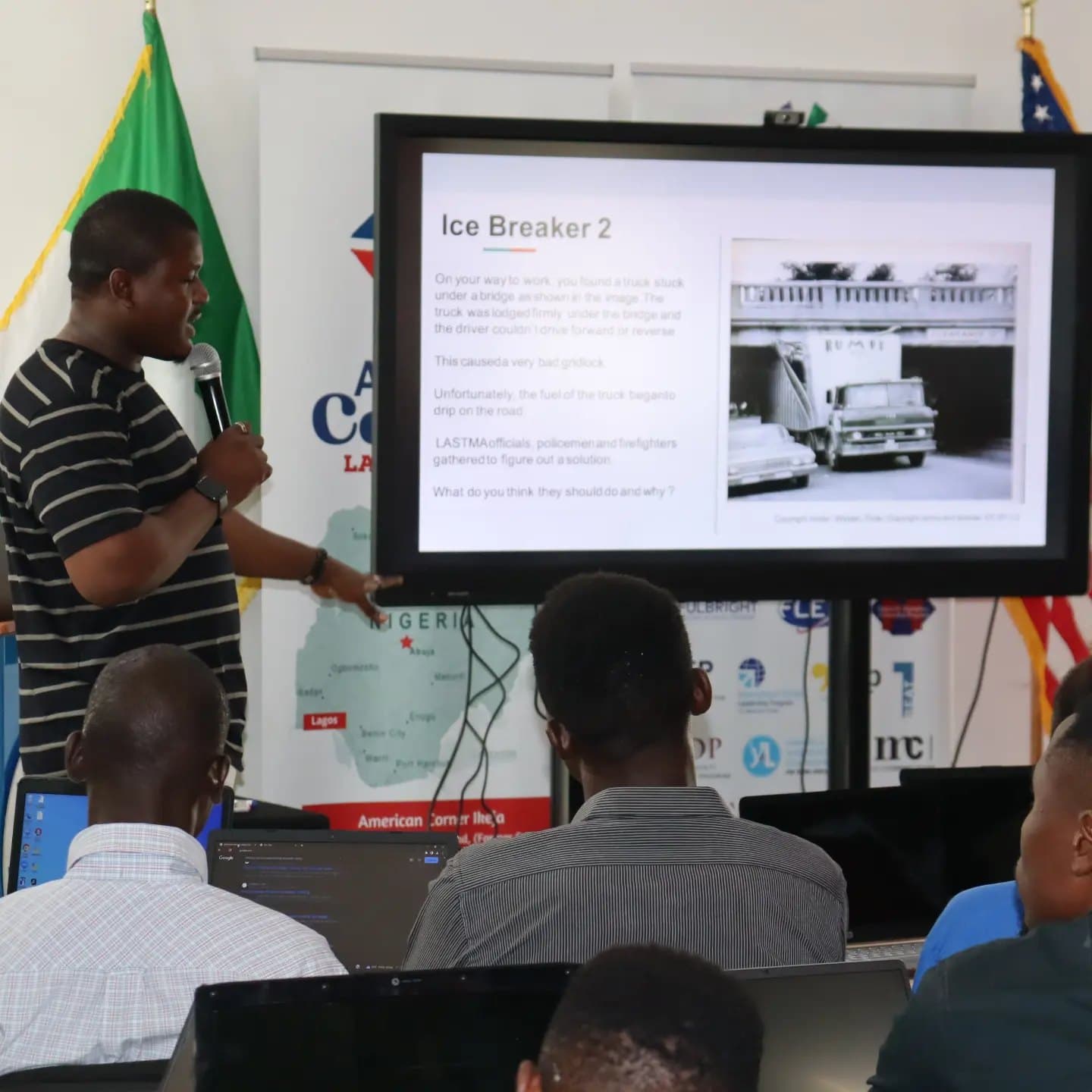 Adebayo Chike opening a session with an ice-breaker slide at American Corner Ikeja